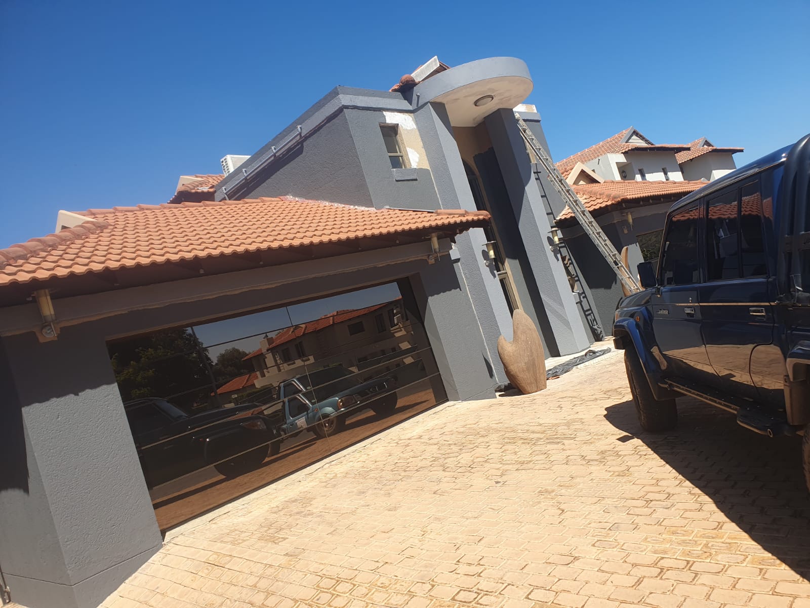Modern double storey house renovation and exterior painting in Brits